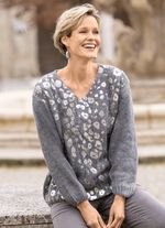 Tr&ouml;ja med gl&auml;nsande folietryck 