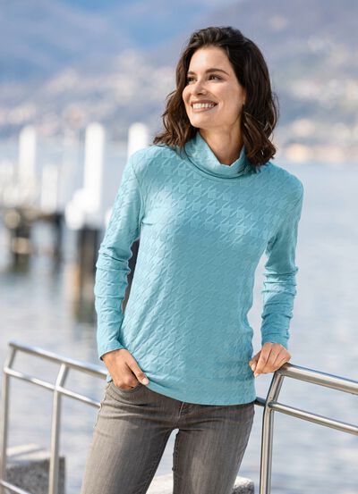 Skjorta i l&auml;tt skimrande kvalitet 