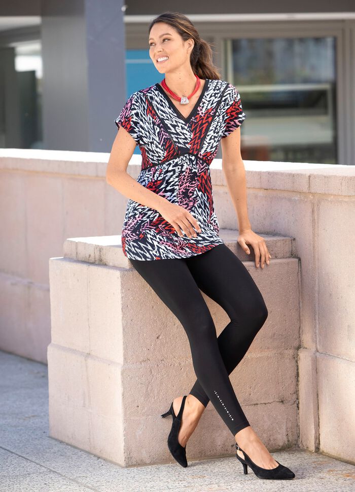 Uttrycksfull tunika med V-ringning 