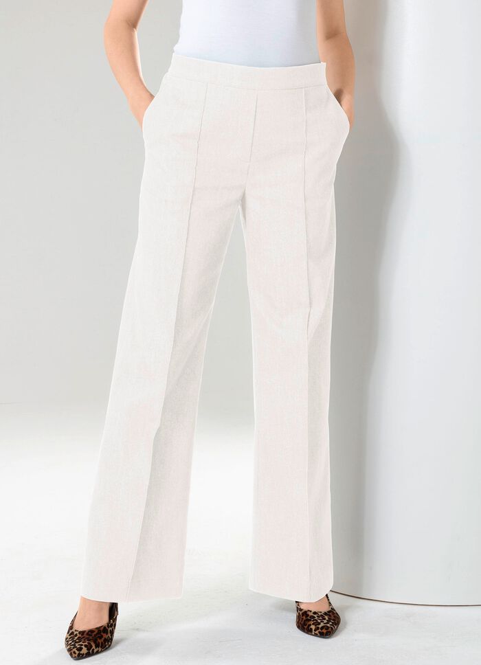 Jeans med l&auml;tt utsv&auml;ngda ben 