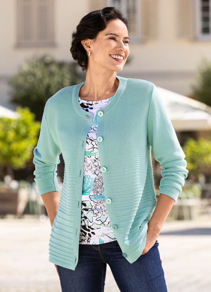 Stickad kofta med kantband 