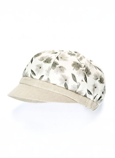 Moderiktig tidningsmössa för damer med elastisk insats 