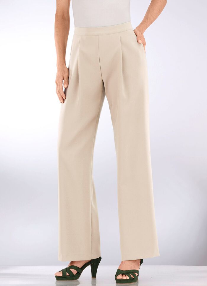 Byxor med veck i midjan i modern vidlek 
