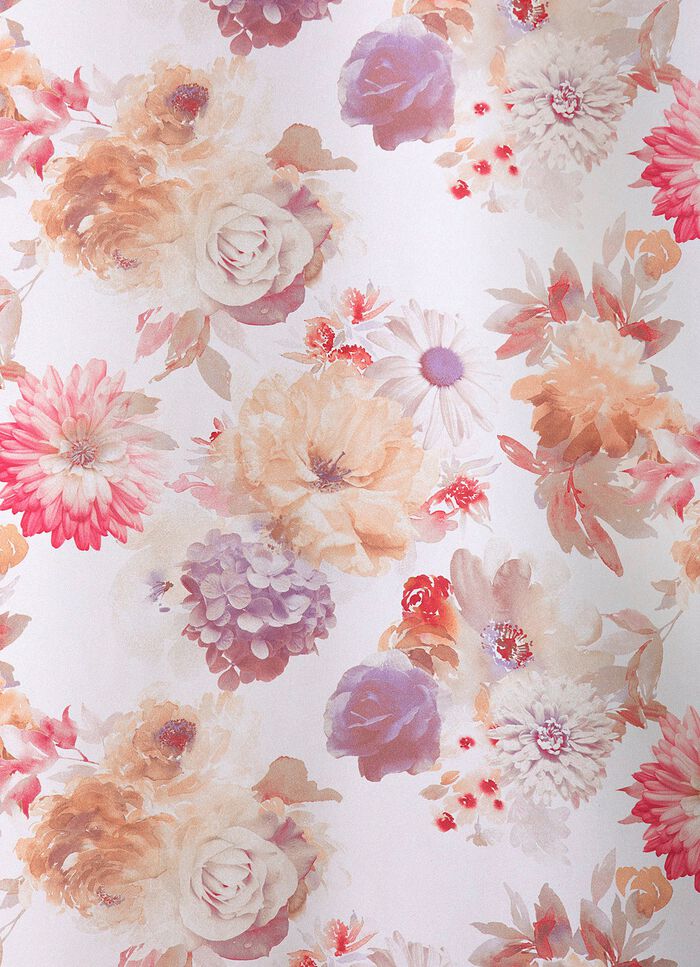 Blommig design &ouml;ver gardinen 