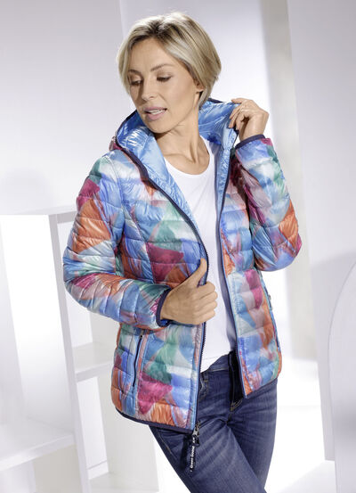 Funktionell vändbar jacka med fast huva 