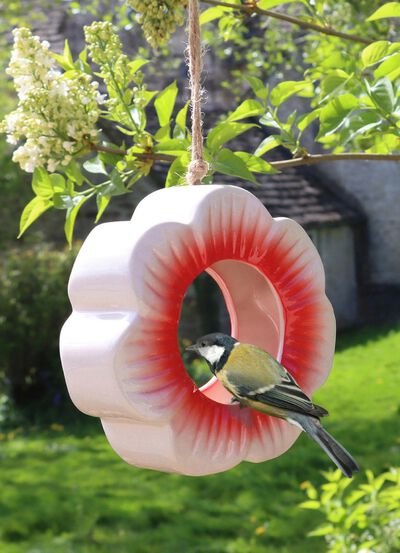 Vallmofoderstation av glaserad keramik 