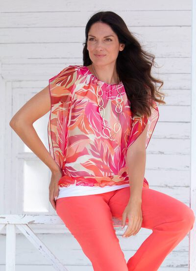 Ponchotunika med integrerad topp 