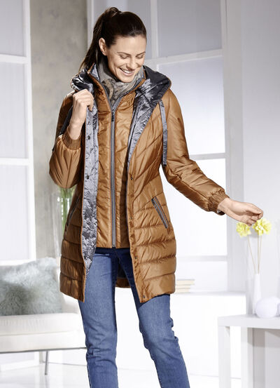 Kort kappa med v&auml;stinl&auml;gg 