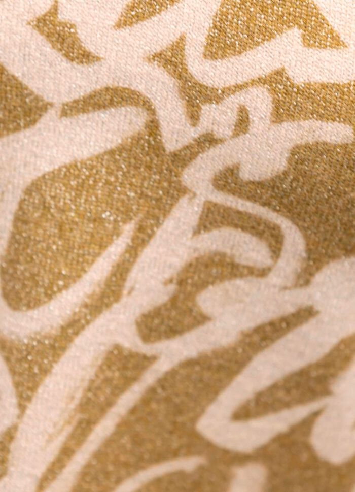 Finstickad tr&ouml;ja med glitter 