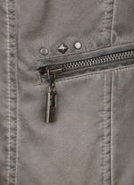 Kavaj med diskreta nitar 