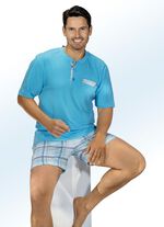 Shorty med knappsl&aring;, patchad br&ouml;stficka och rutigt m&ouml;nster 