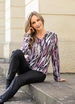 Tunika med dekorativa knappar 