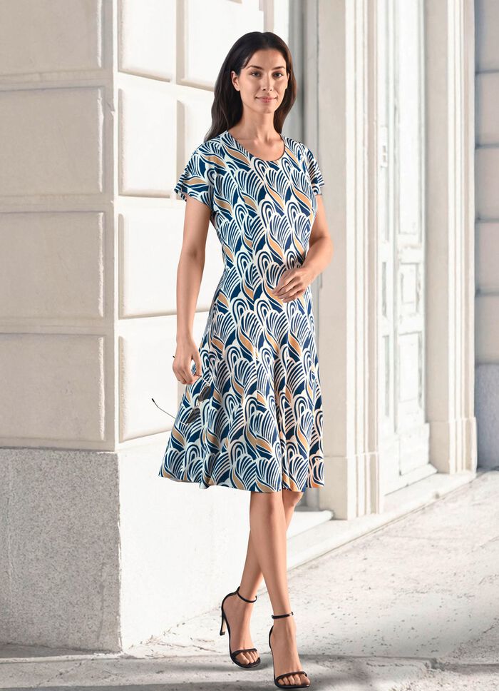 Kl&auml;nning med fint tryck 