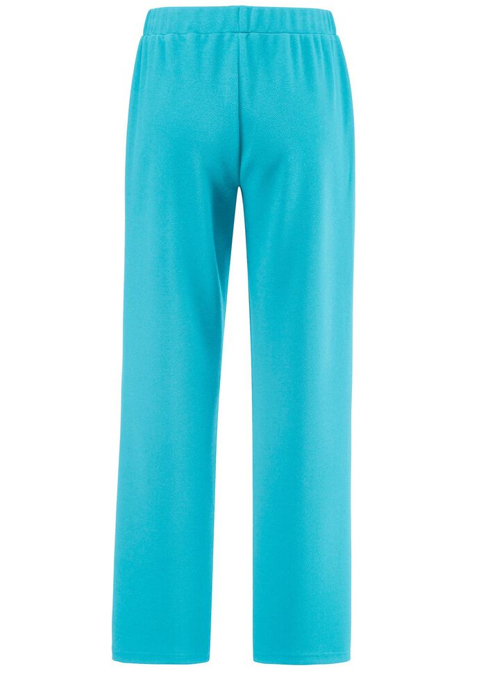 Byxor med dekorativa knappar 