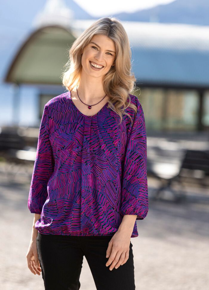 Tunika med elastiska muddar 