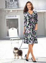 kl&auml;nning med omlottm&ouml;nster 