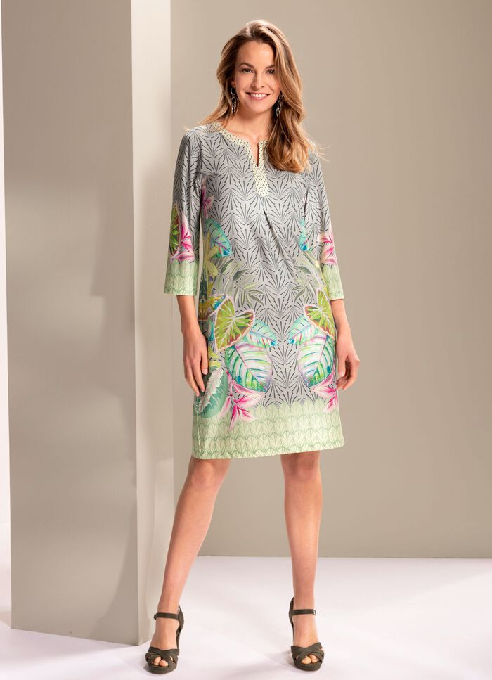 Kl&auml;nning med snygg kanttryck 