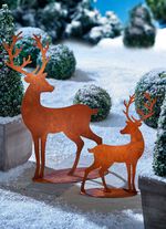 R&aring;djurssilhuetter av rostig st&aring;lpl&aring;t 