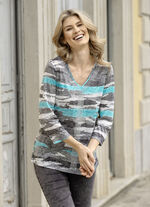 Skjorta med silverfärgade dekorativa tallrikar 