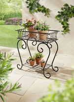 v&auml;xtst&auml;ll av metall 