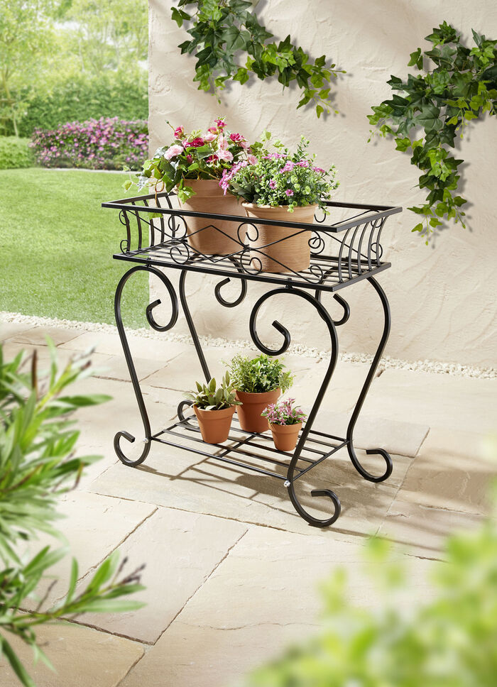 v&auml;xtst&auml;ll av metall 