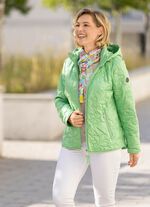 Jacka med laserquiltade blommotiv 