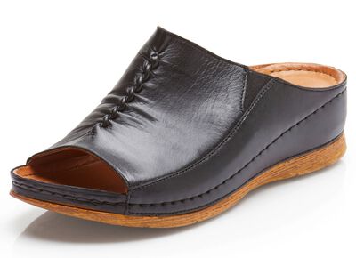 Slip-in-skor fr&aring;n Gemini med res&aring;rinf&auml;llningar i sidorna 