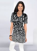 L&aring;ng skjorta i l&auml;tt utsv&auml;ngd form 