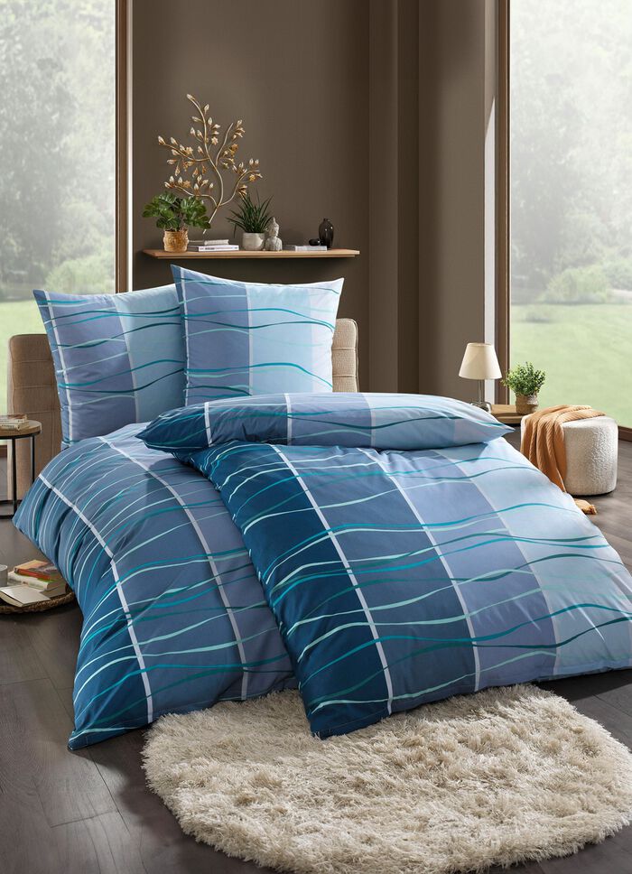 S&auml;ngkl&auml;der set tryckt p&aring; b&aring;da sidor 