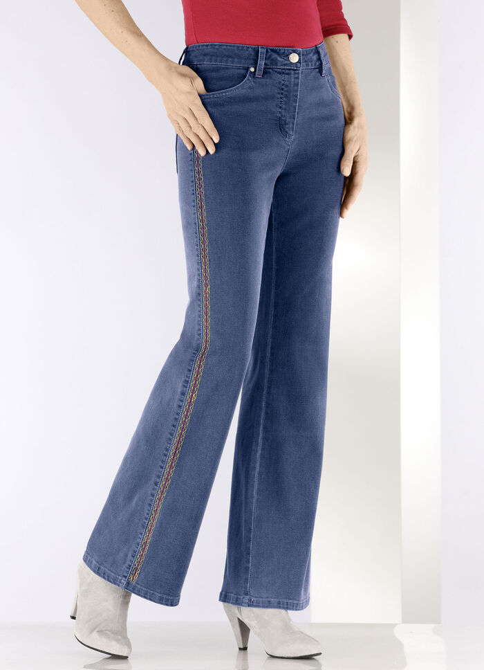 Jeans med dekorativa sömmar i etnisk stil JEANSBLÅ