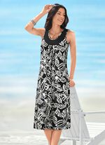 Kl&auml;nning med f&auml;rgstarkt tryckt m&ouml;nster 