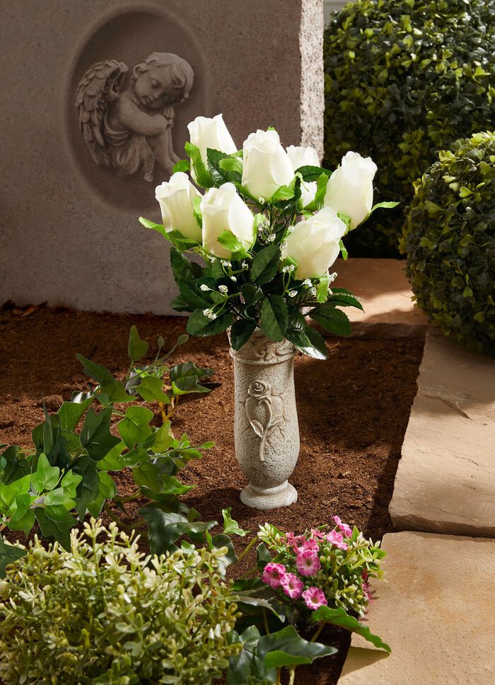 gravvas med arrangemang 