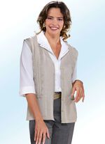 Stickad v&auml;st med kabelm&ouml;nster 