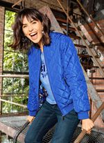 V&auml;ndbar blus med ribbade muddar 