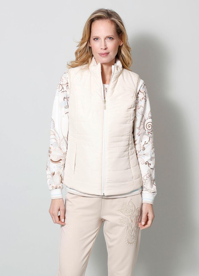 V&auml;ndbar v&auml;st med fickor med dragkedja 