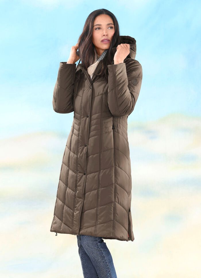 Kappa med sidoslitsar med dragkedja 