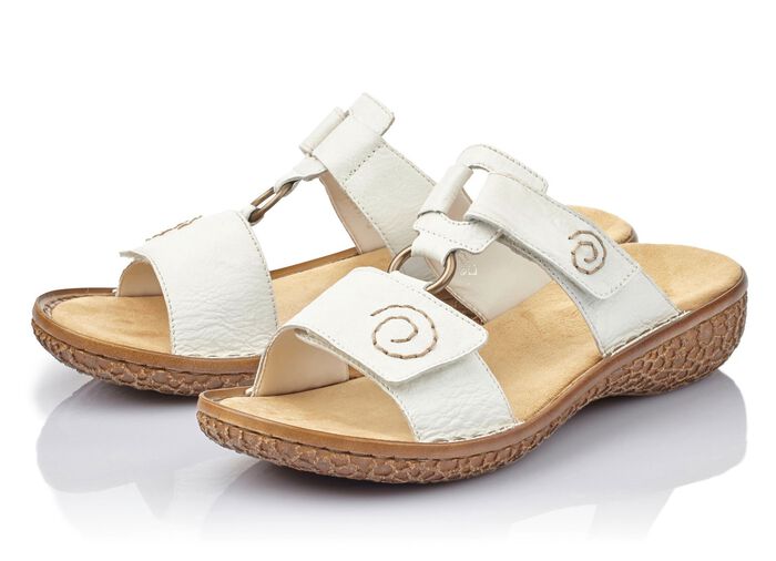 Slip-in-skor fr&aring;n Rieker med diskreta dekors&ouml;mmar VIT