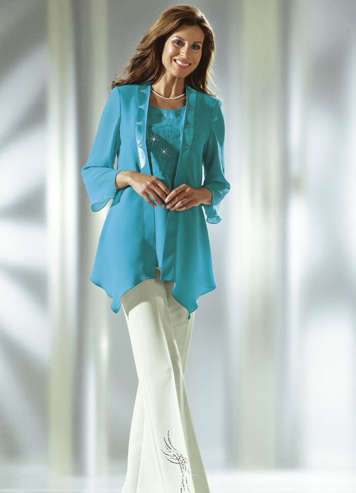 Byxor med dekorativa strasstenar 