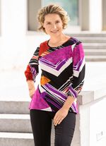 Uttrycksfull skjorta med smockade muddar 