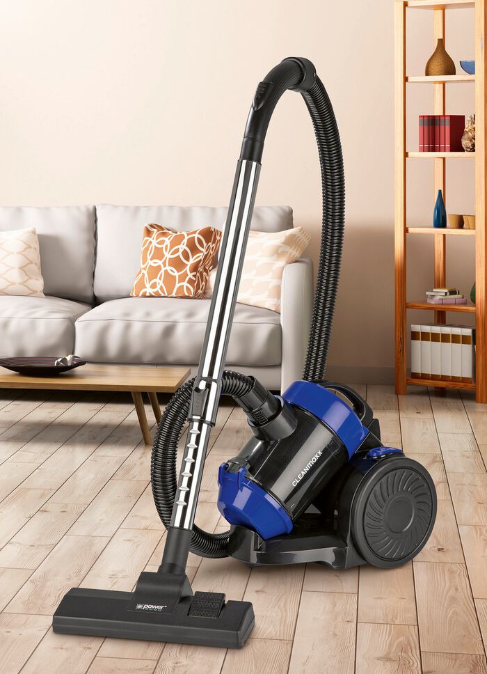 Dammsugare i beh&aring;llare med automatisk sugkraftreglering 