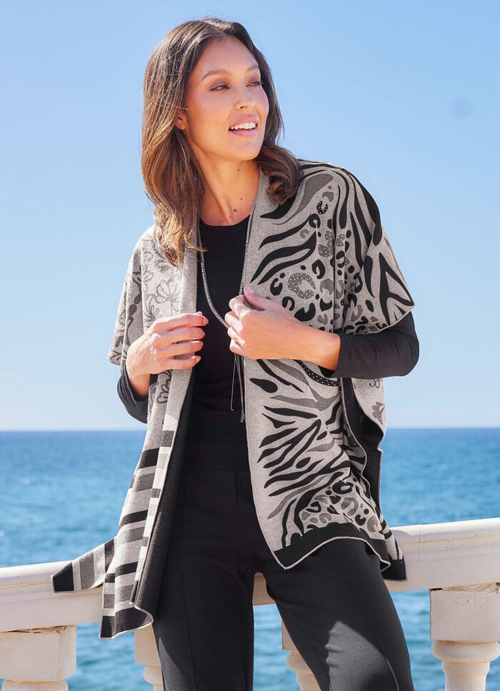 Poncho med elegant jacquarddesign 