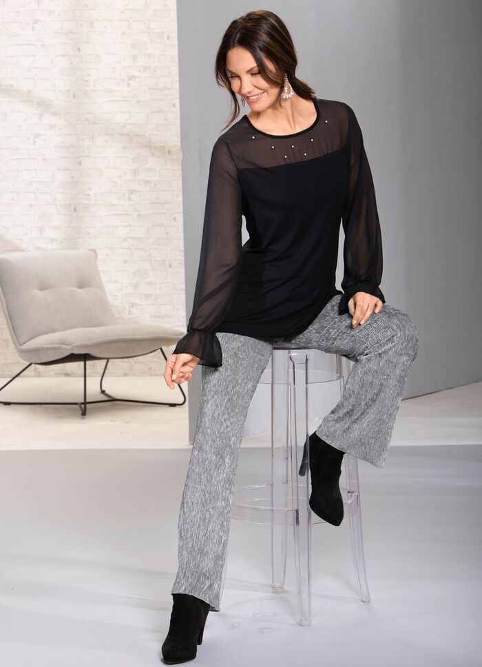 Eleganta, skimrande byxor 